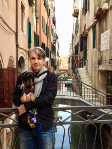 Born in Italy, Vivian has visited much of the country. Here she poses with Frank, Joseph’s husband, in Venice.